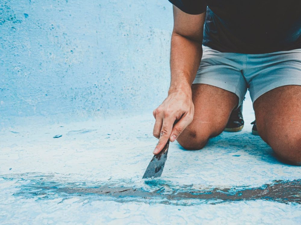 Close Up Of A Man Fixing The Flo